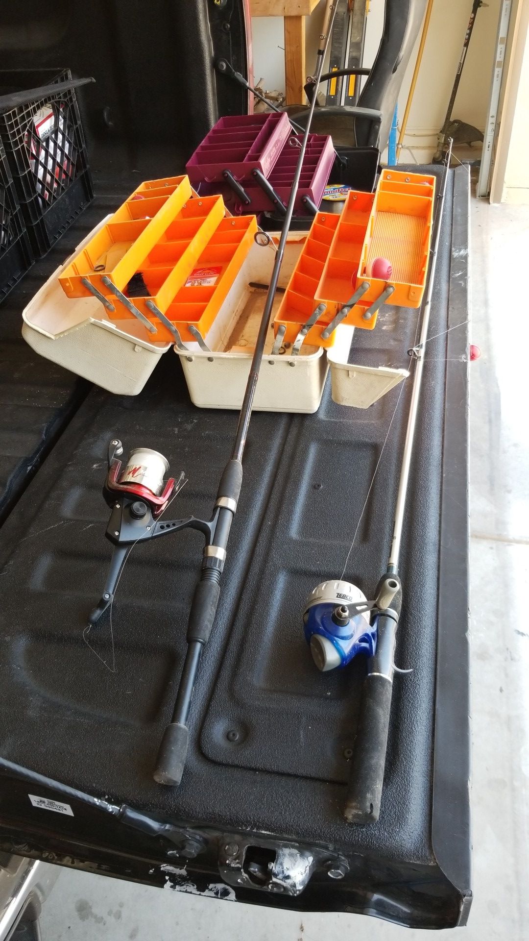 Fishing rods, tackle boxes, and misc. Accessories