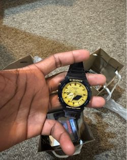 Black and gold g shock