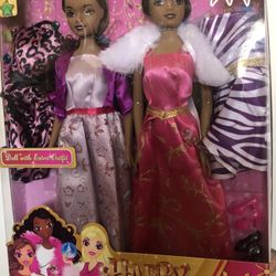 2 Dolls With Extra Outfits