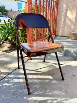 Vintage-Style Metal Chair with Leather Seat – $10
