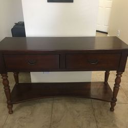 Dark brown wood console table