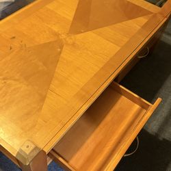 Wooden center table with glass protector