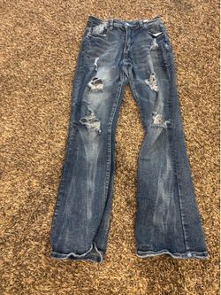 Bell bottom jeans with rips