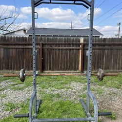 Squat Rack And Olympic Bar