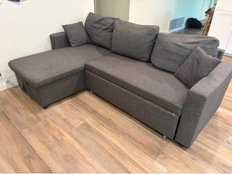 Sleeper sectional sofa with storage