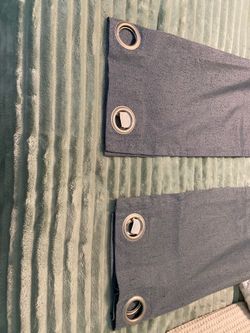 2 Curtain Panels. Grey in Color.