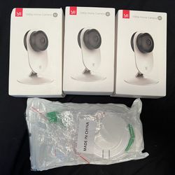 3 Home Cameras YI and supports