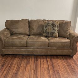 Brown Western Cabin Or Farmhouse Style Couches From Ashley’s 