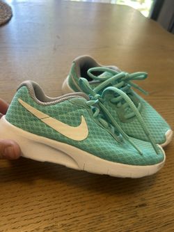 Toddler bright teal Nike sneakers