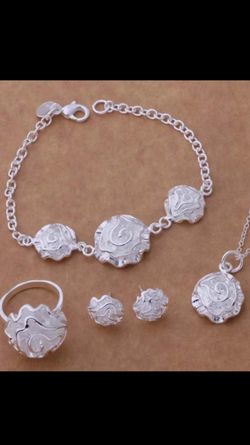 Four piece sterling silver set