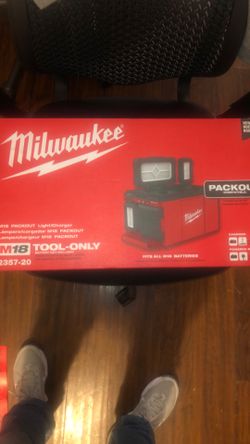 Milwaukee pack out light/charger