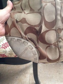 Nice purse, it has minor use as you see in picture but inside has no damage.