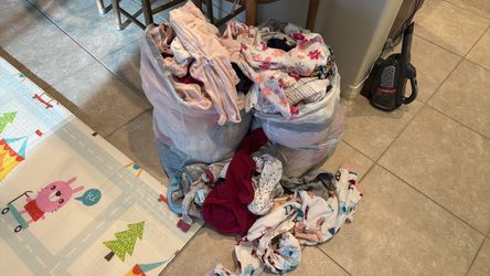 bag of used kids clothes