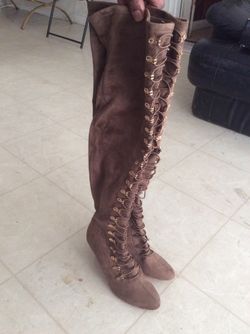 Brown thigh high lace up boots