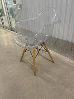 Lucite shell chair… 27” high , 24” depth , 25” wide . $50