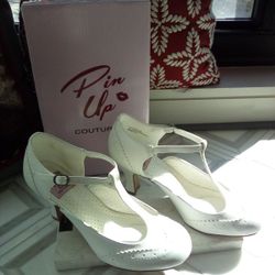 WHITE  T_STRAP MARY JANE SHOES.