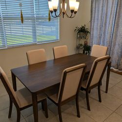 Wood Brown Dining Table And 6 Chairs
