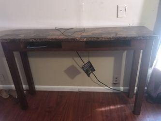 Mesa con usb para colectar las tabletas
