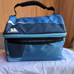 Arctic Zone insulated lunch box in a blue and dark blue color scheme.
