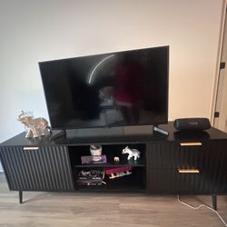Sleek Black TV Stand – 2 Drawers + Sliding Door