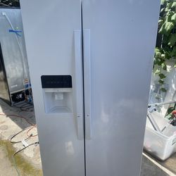 Side by Side whirlpool refrigerator