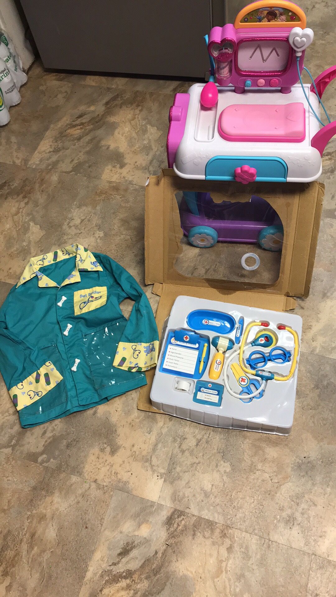 Doc Mc stuffins cart with pet dr top and new medical kit $25