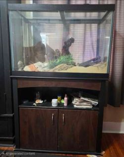 65 gallon Aqueon fish tank with stand