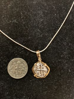 Atocha silver coin pendant in gold bezel with silver chain