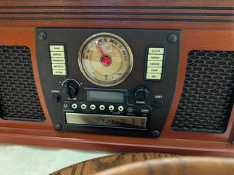 Victrola Navigator 8-in-1 Classic Bluetooth Record Player in mahogany.