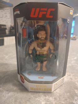 UFC Connor “The Notorious” McGregor Octagon Fighter 4” Figure New In unopened box.