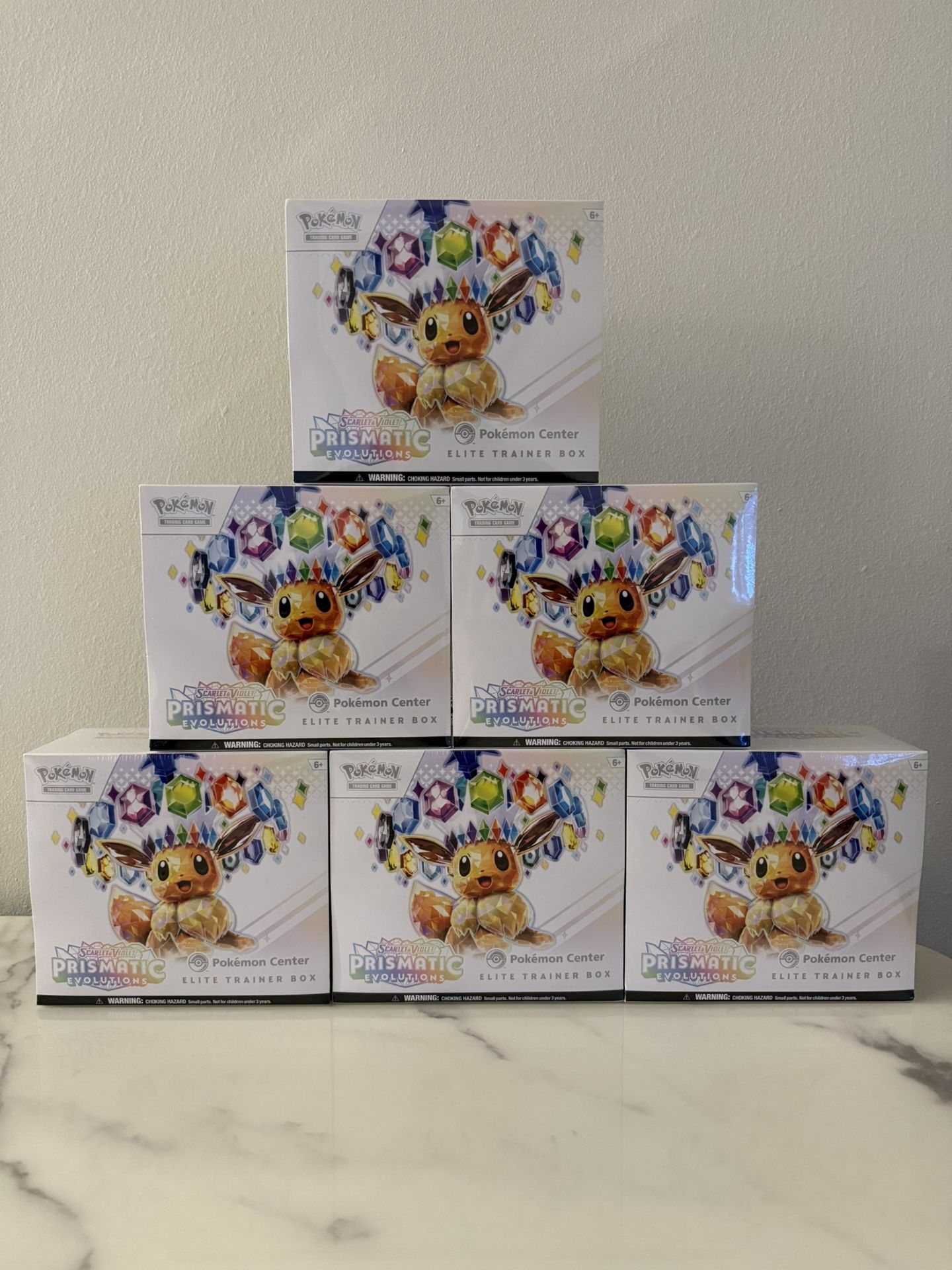 Pokemon Prismatic Evolutions Pokemon Center Elite Trainer Box