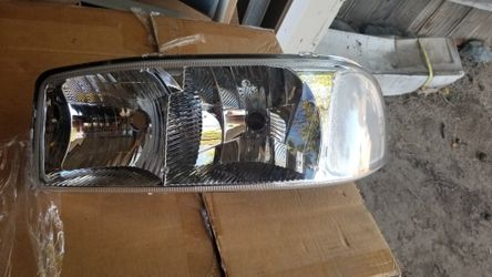 2002 gmc sierra headlights