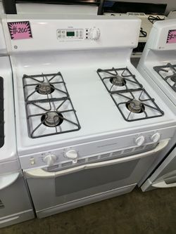 GE white gas range working perfectly