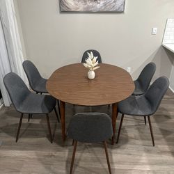 Brown Extendable Table and 6 Gray Chairs