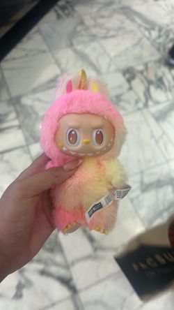 Pink and yellow loyalty labubu