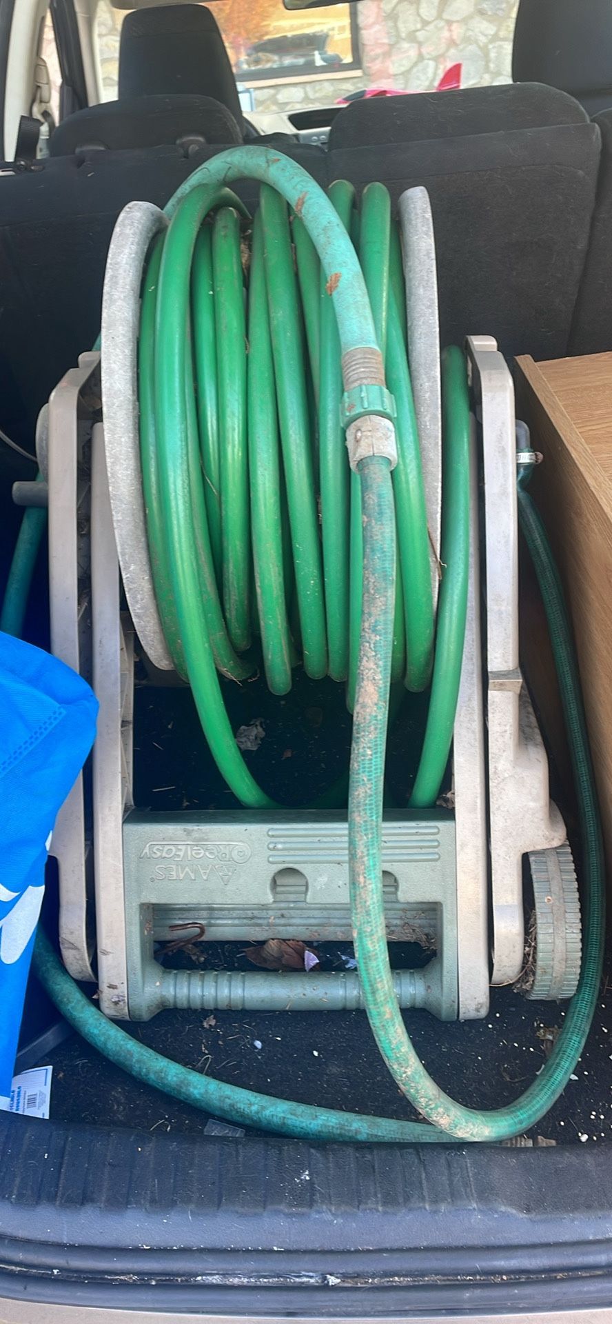 Garden Hose And Roller Comes With The Attachment For The House, Like New East Haven.