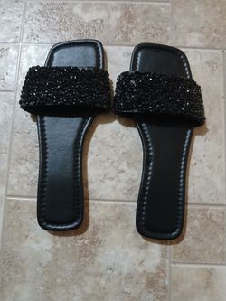 black beaded sandals.