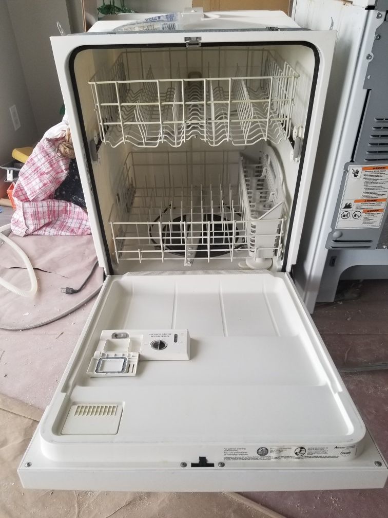 Whirlpool fridge and stove; Amana dishwasher.