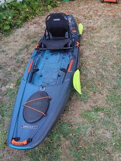 Yukon angler fishing kayak, 12 ft long ,(350 lb load capacity) best deal on the web.