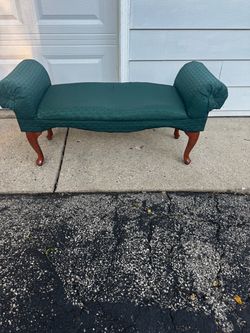upholstered green bench
