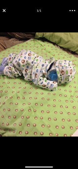 Hand made sleeping baby diaper cake. Many colors/styles and themes available.