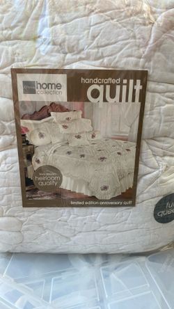 JCPenney Home Collection "handcrafted quilt" described as a "limited edition anniversary quilt" with "finely detailed heirloom quality