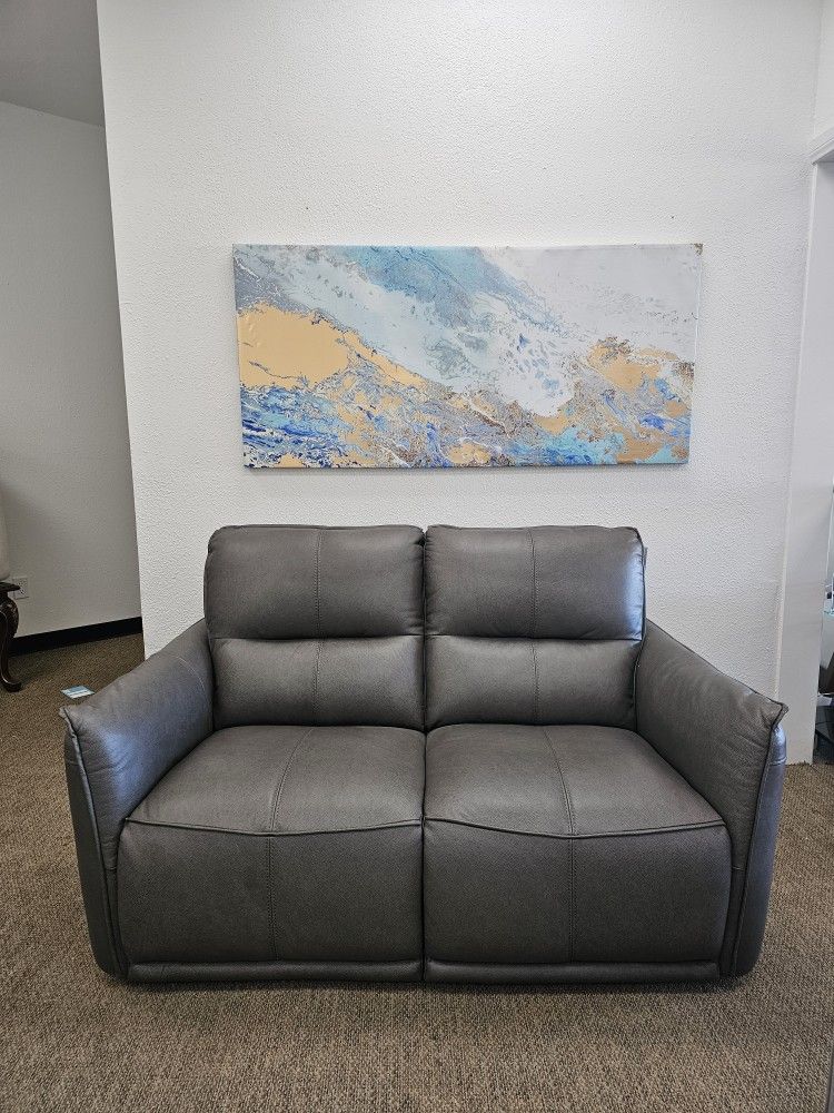 Leather Loveseat w/ 2 power recliners - Polner
