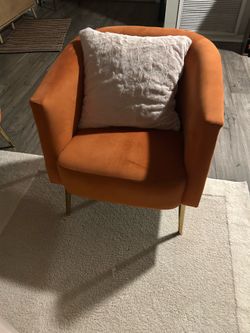 Modern crushed velvet orange chairs