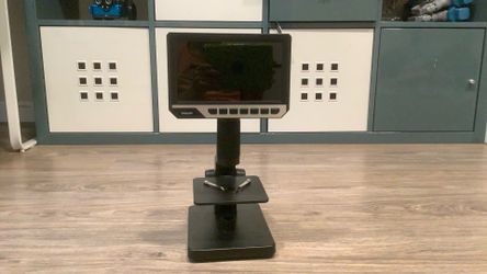 Microscope with charger and optical lenses