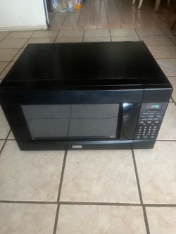 Kenmore microwave 24 inch long 18 inch wide