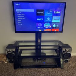 55" Samsung TV with Stand, Roku stick & Speaker system