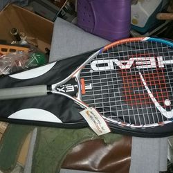 "Wilson" tennis racket with "Head" tennis racket bag