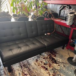 Furmax Futon Sofa Bed Convertible Folding Faux Leather Couch with 2 Cup Holders,