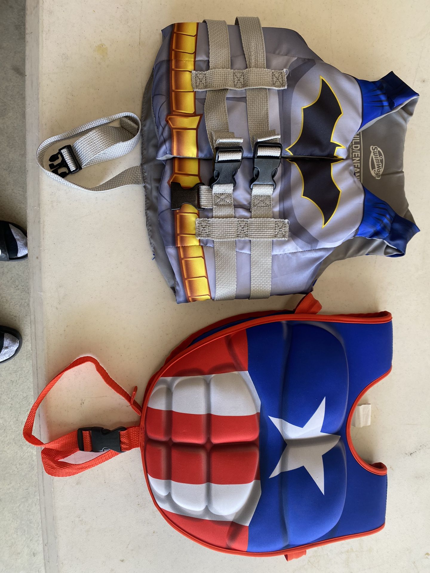 Two Kids Superhero Life Jackets Batman And Captain America